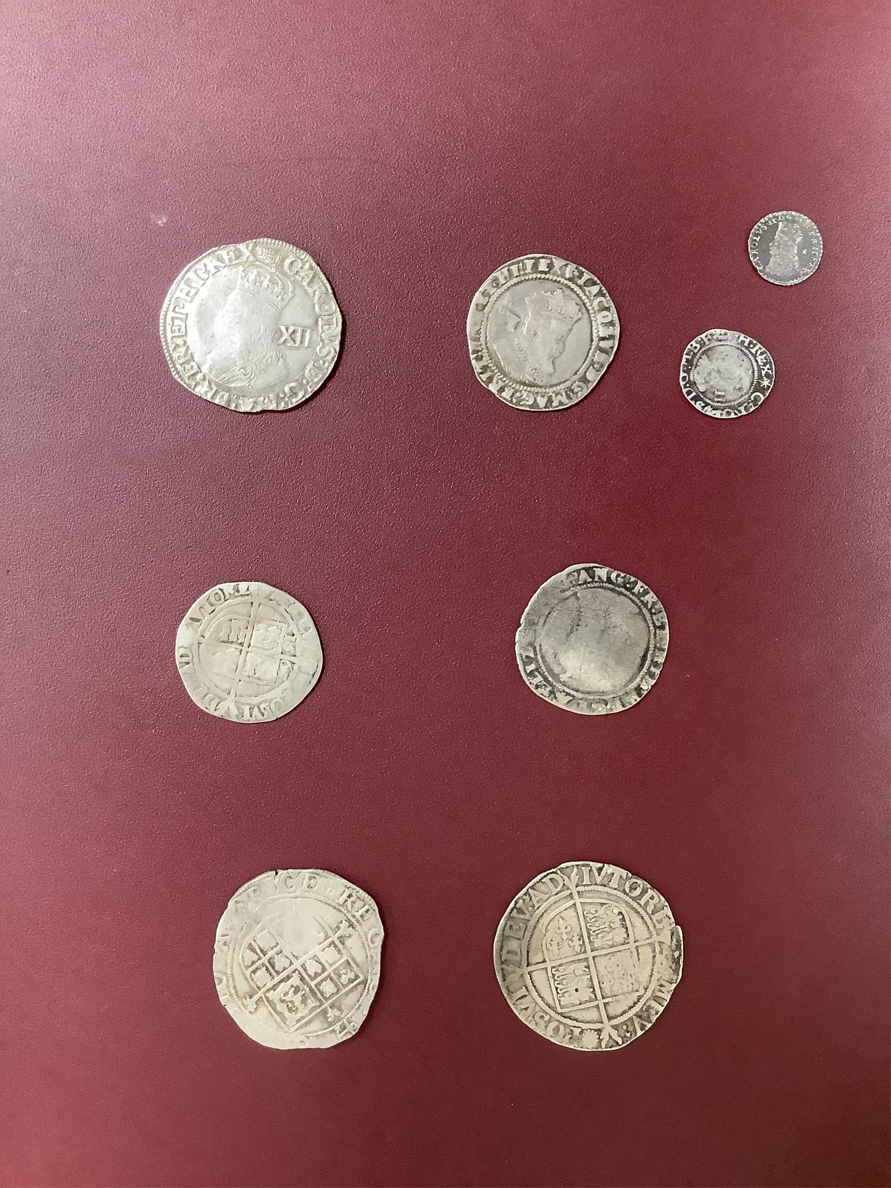 British Tudor and Stuart hammered silver coins, an Elizabeth I shilling and two sixpences, a James I sixpence, two Charles I shillings, a Charles II penny, first issue, 1660-62, (S3311) VF, twopence (S3310) (8)